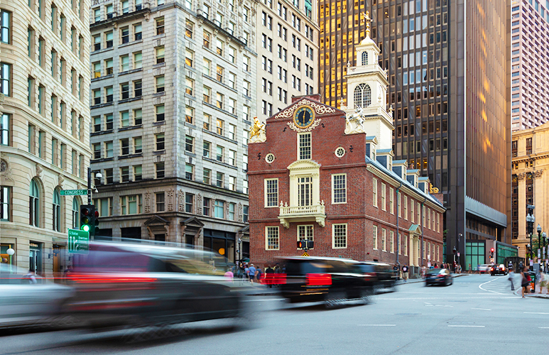 The Old State House in Boston with Cars Driving by