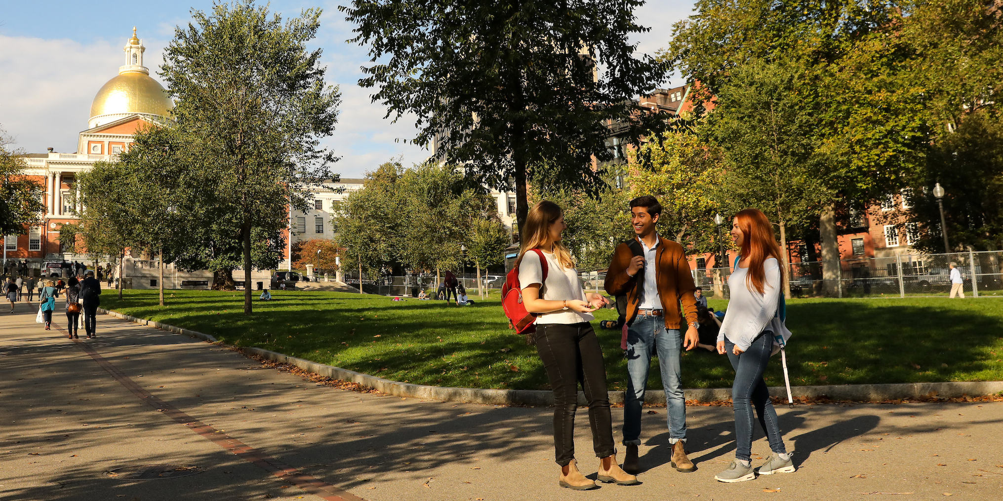 Suffolk student stroll through the Boston Common and Public Garden in the fall.