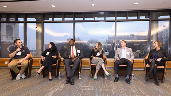 Image of panelists at the "Business With Purpose: Beyond the Balance Sheet" panel discussion