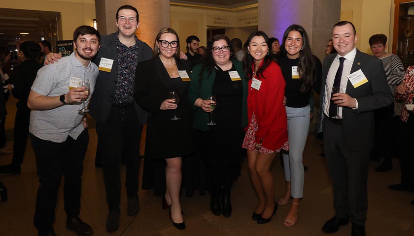 Members of the GOLD Council, the co-hosts and organizers for the 10 Under 10 event, gather at the opening reception