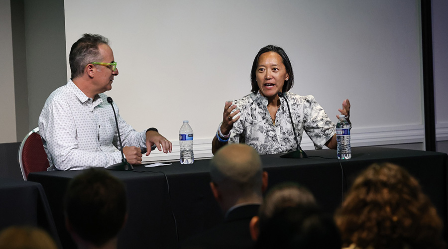 Scott Kirsner from the Boston Globe and Secretary of Economic Development Yvonne Hao speak at the keynote session of Startup Boston Week 2024