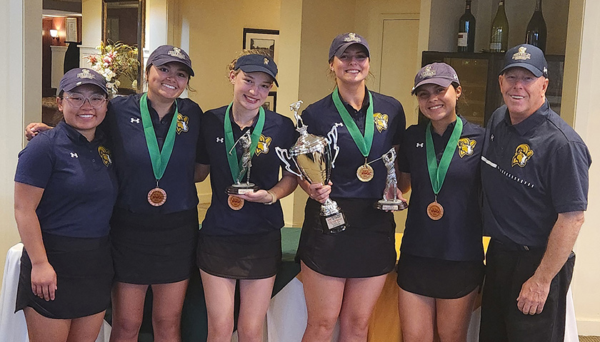 The Suffolk 2024 Northeast Women’s Golf Conference champions (from left): Sophie Kiley, Ella Torsleff, Brooke Bugajewski, Ellie Yarbrough, Isabel Smith, and Head Coach Jay Parker.