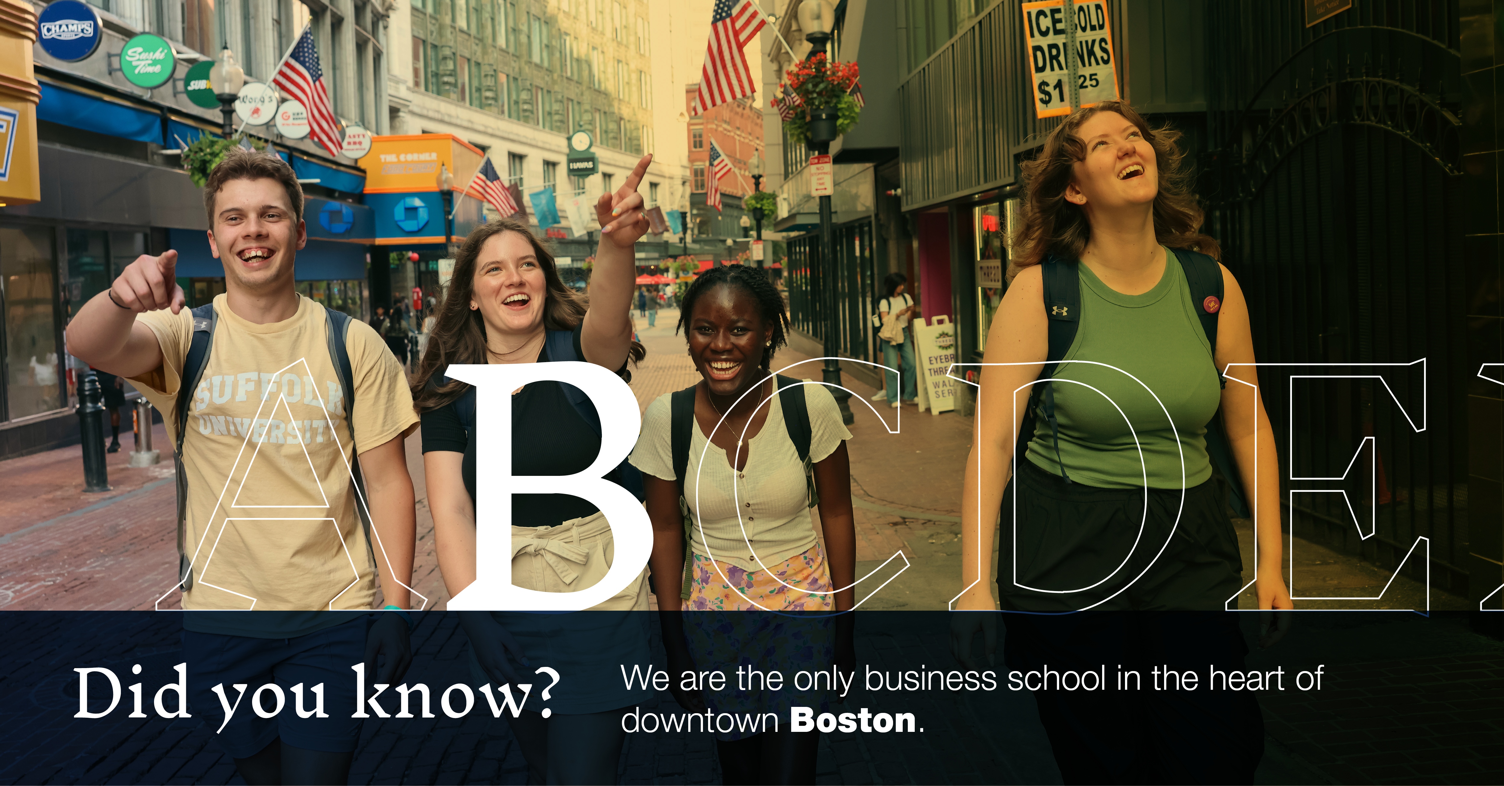 Image of students walking through DTX: "Did you know were are the only business school in the heart of downtown Boston?"